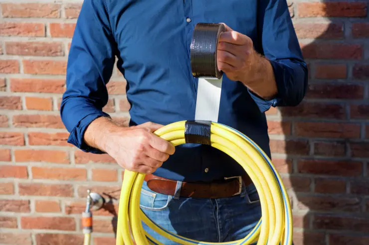 Bison-Tape-Applications-Power-Repair-Black-Hose
